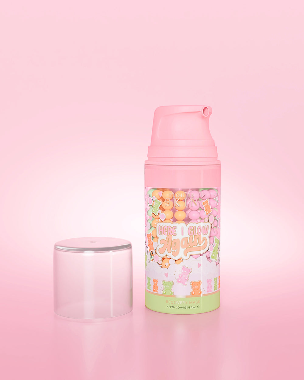 Frasco roxo de máscara de recuperação P. Louise Here I Glow Again Candy Bears em fundo rosa