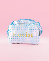 Bolsa de maquiagem e cuidados com a pele P.Louise listrada em azul e branco com babados e design azul framboesa