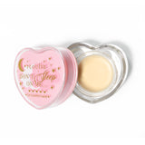 Máscara para dormir con labios en forma de corazón rosa con la tapa abierta sobre un fondo blanco