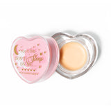 Máscara para dormir con labios en forma de corazón rosa con la tapa abierta sobre un fondo blanco