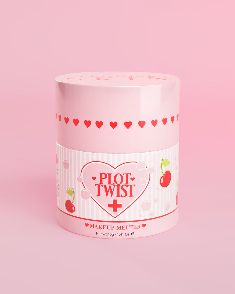Um recipiente rosa de P.Louise Plot Twist Makeup Melting Cleansing Balm com desenhos de coração e cereja no rótulo contra um fundo rosa