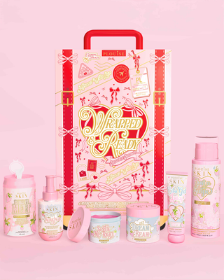 P.louise embrulhada e mala pronta