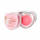 Máscara para dormir con labios en forma de corazón rosa con la tapa abierta sobre un fondo blanco